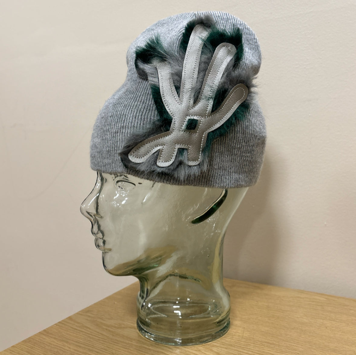 silver/ green fur beanie