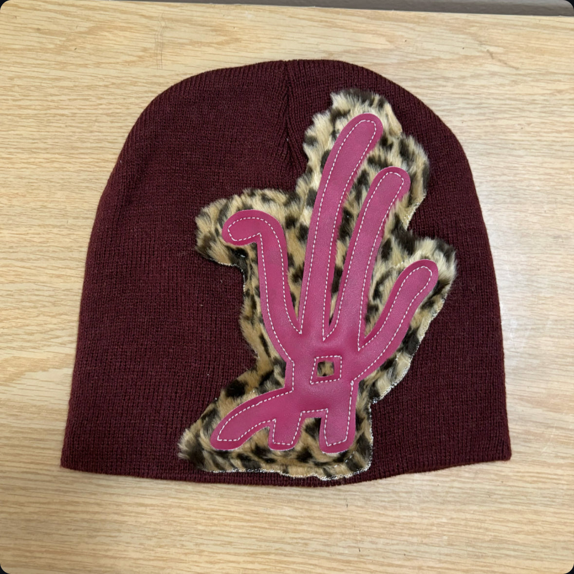 raspberry cheetah fur beanie