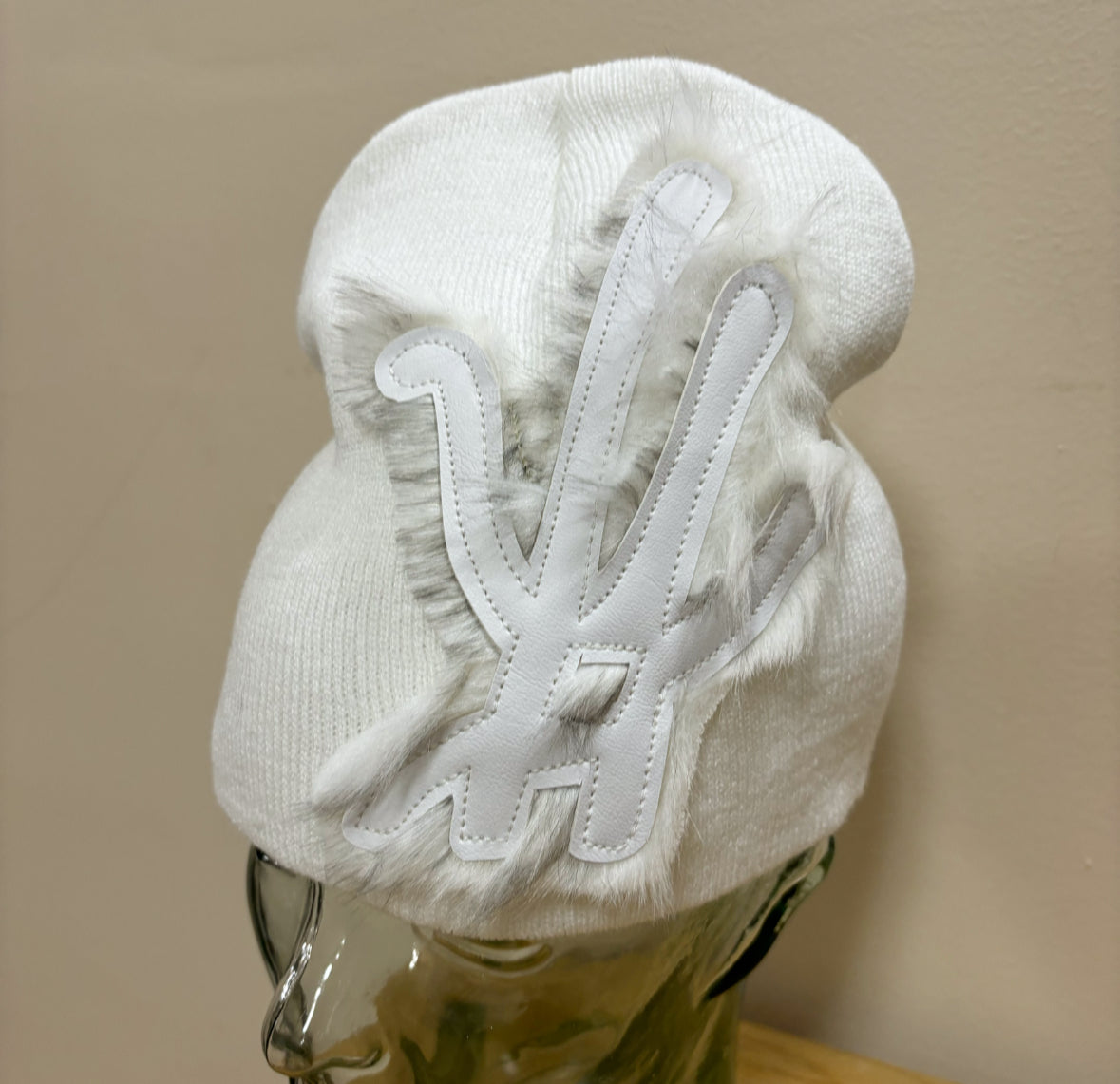 white frosted fur beanie