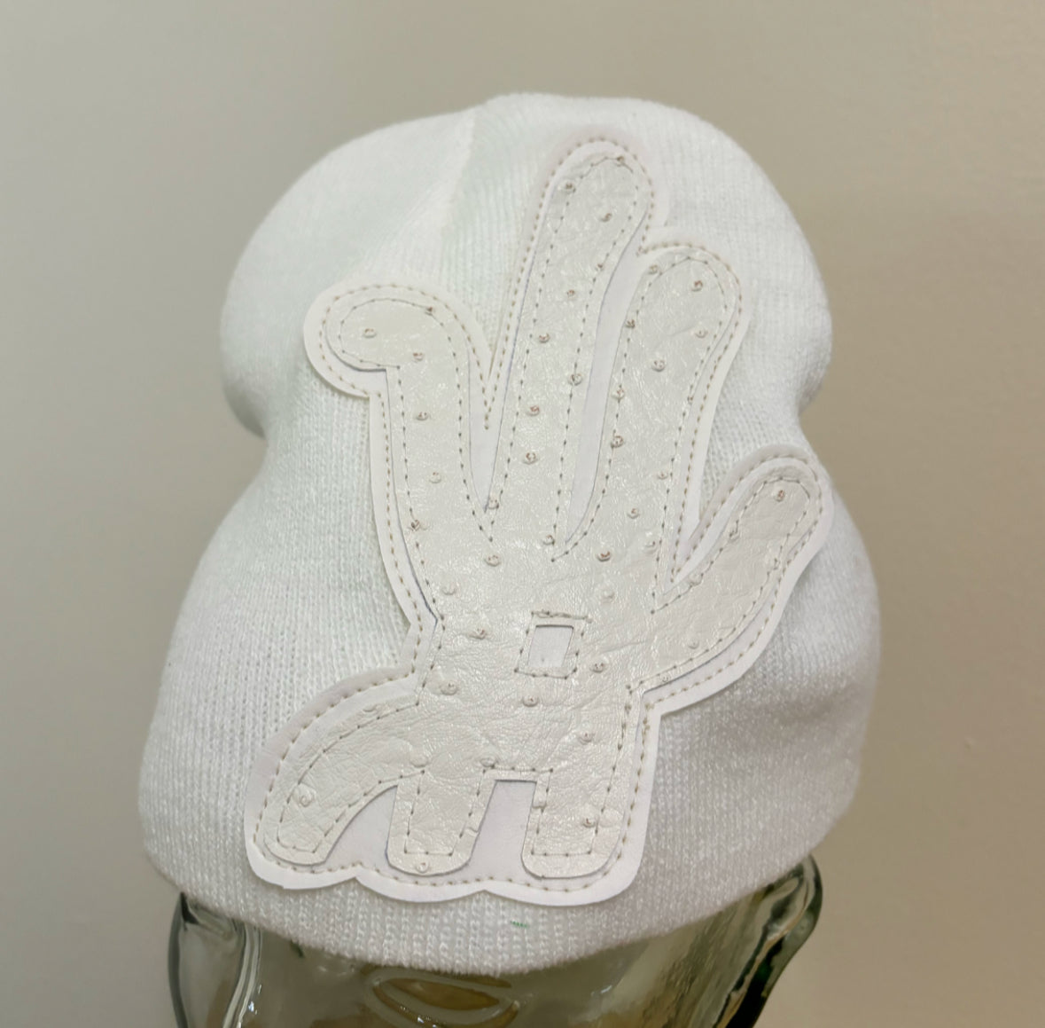 white ostrich beanie