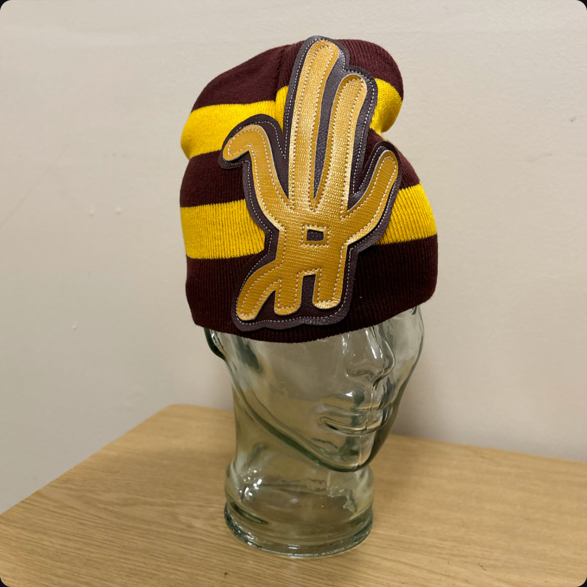 maroon/ gold striped beanie