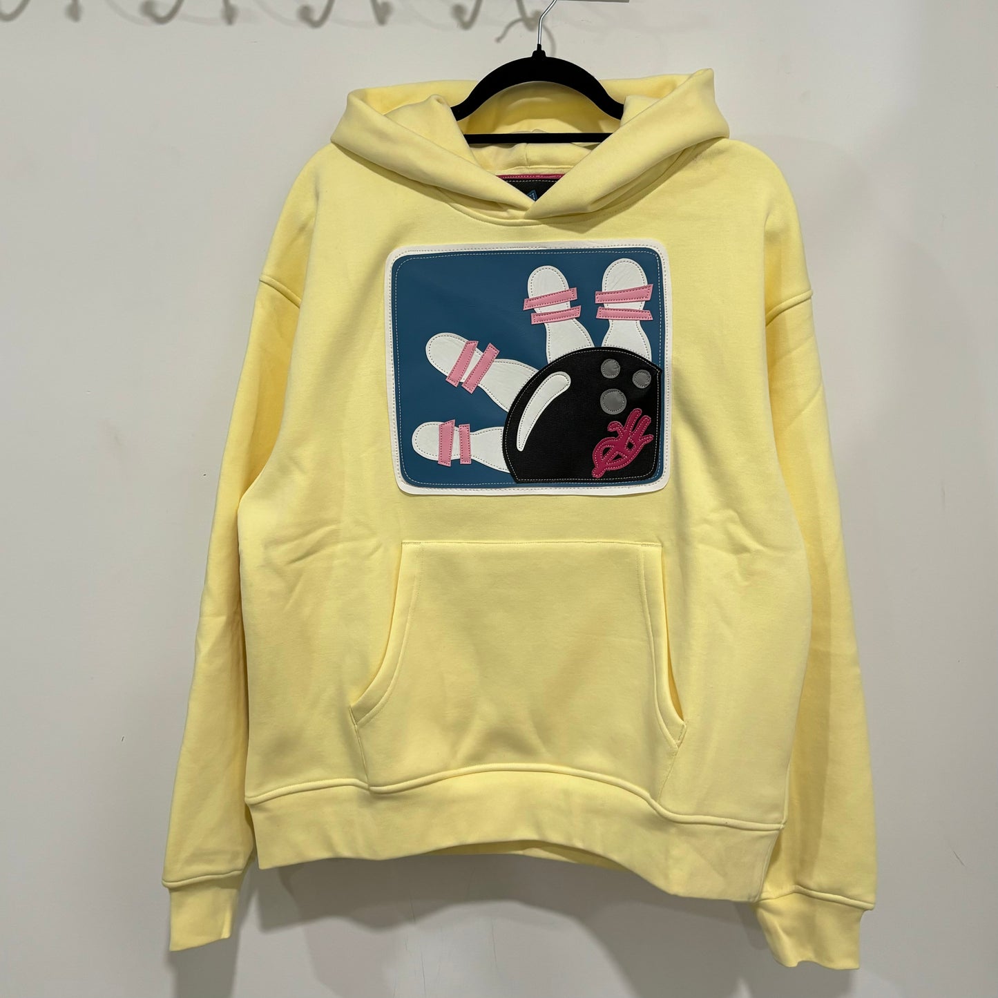 yellow boUwling pullover hoodie