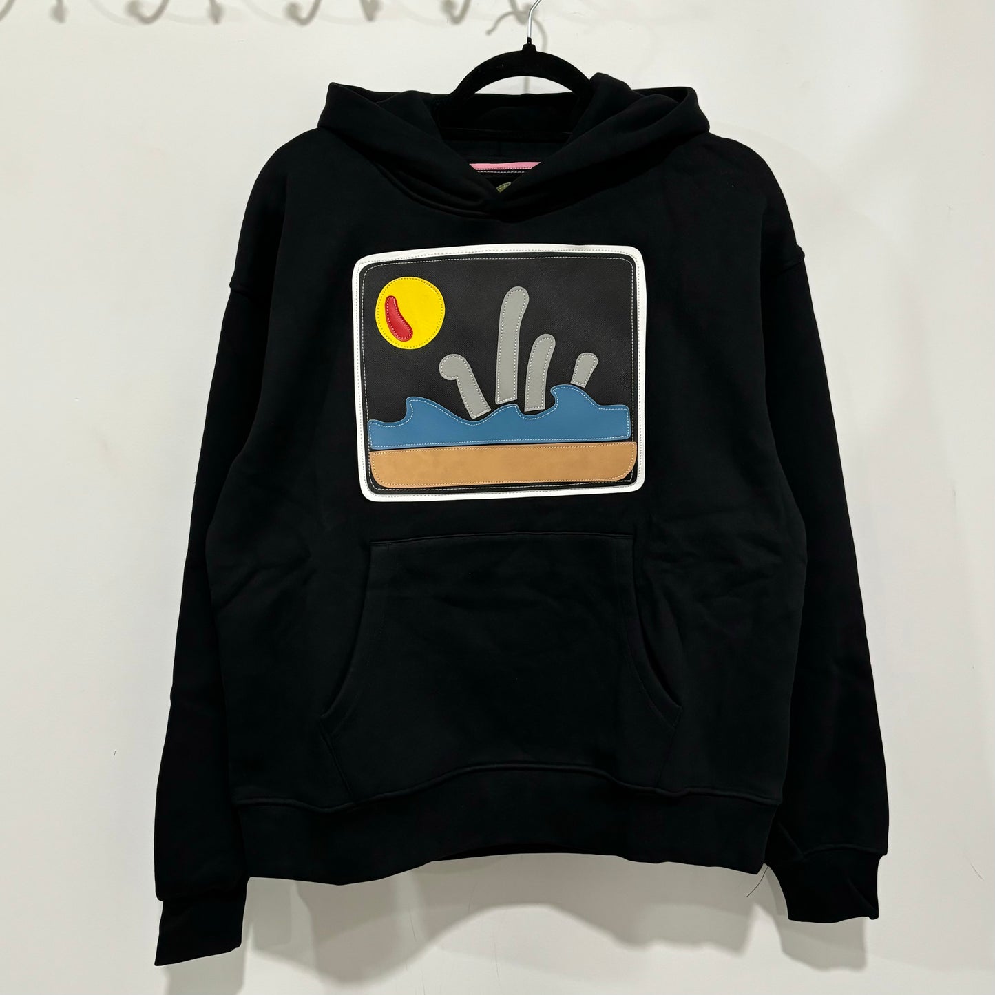 black staying afloat pullover hoodie