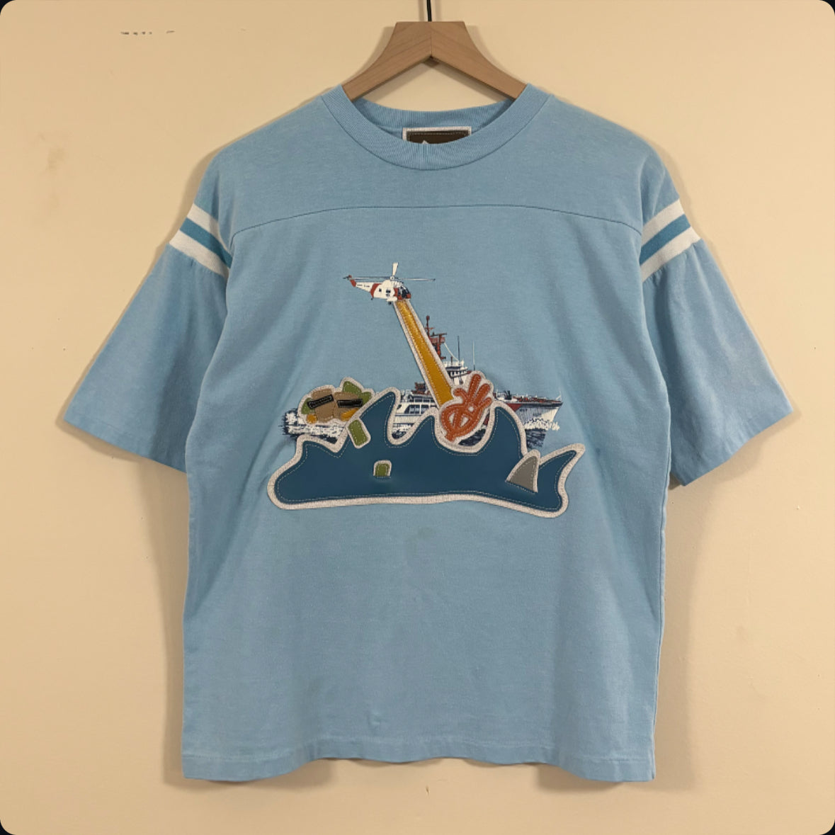 “overseas heist” sky blue t-shirt w/ ribbed knit sleeve paneling (MEDIUM)