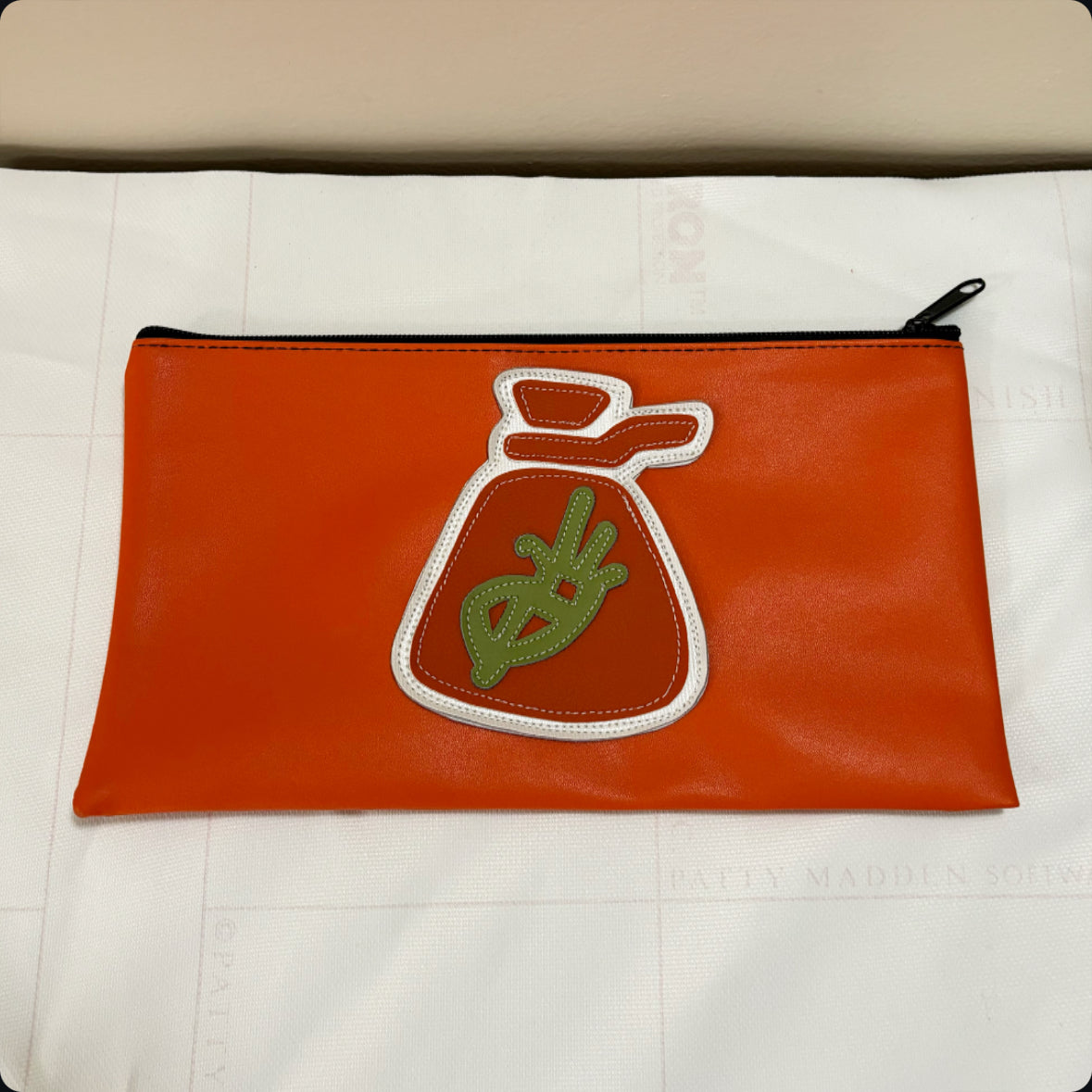 orange moneY bag